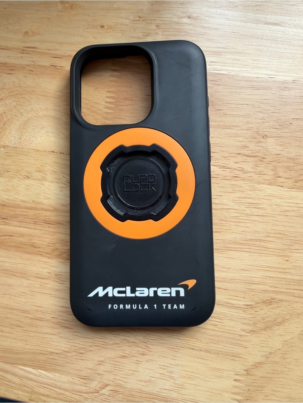 McLaren Black & Orange Quadlock iPhone15pro Case with Lock Mount
